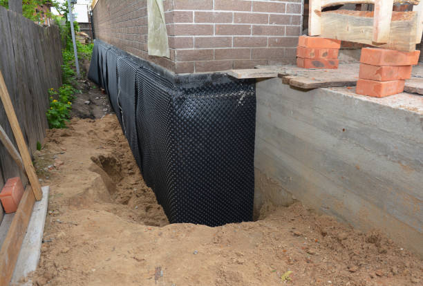 SJ Waterproofing Pros technician performing targeted Foundation Crack Repair assessment in Daleville, IN